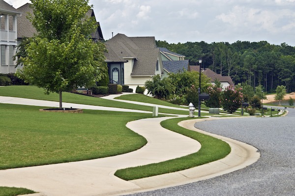 Sidewalk and Homes in Modern Neighborhood